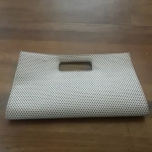White clutch handbag